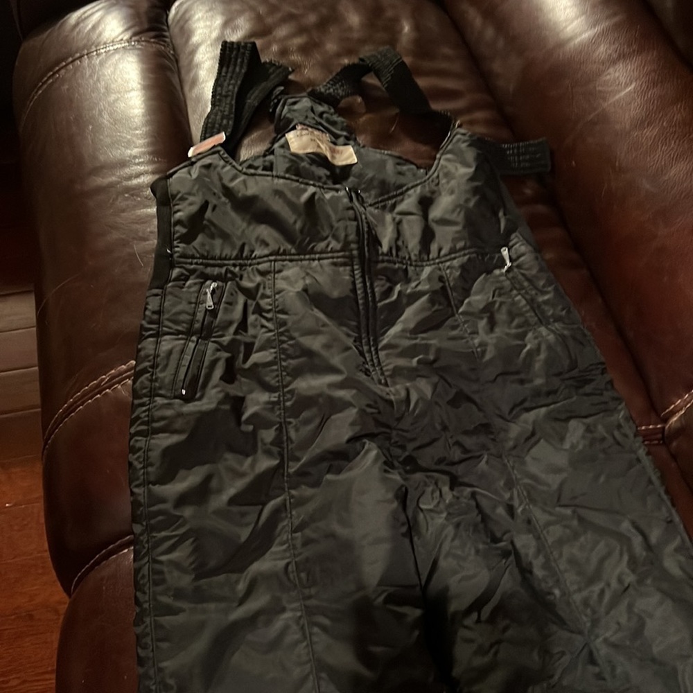 Black overall ski pants